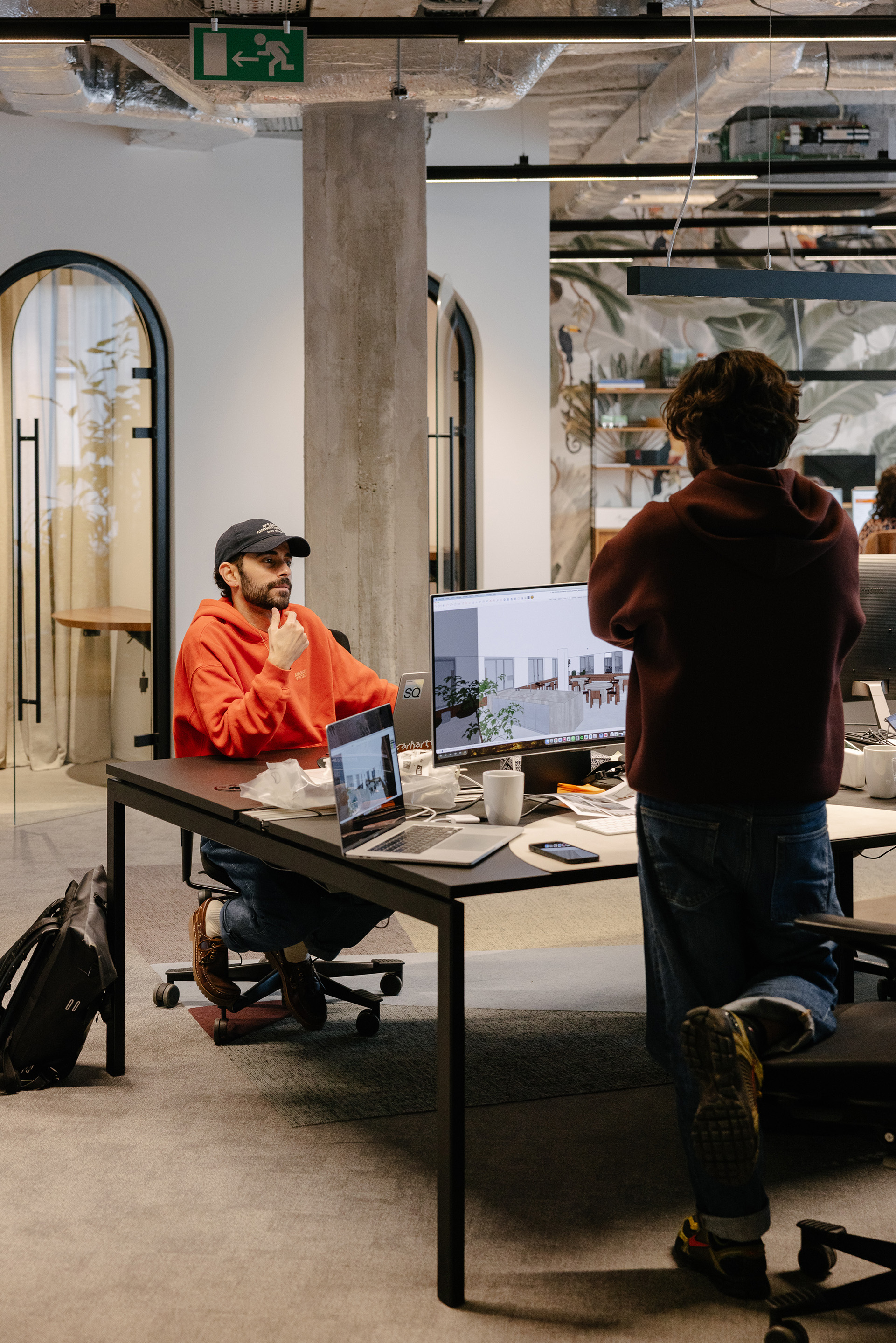 Two colleagues working together at the office